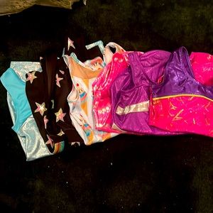 Gymnastics leotards lot of 6 sizes 8-10 years old